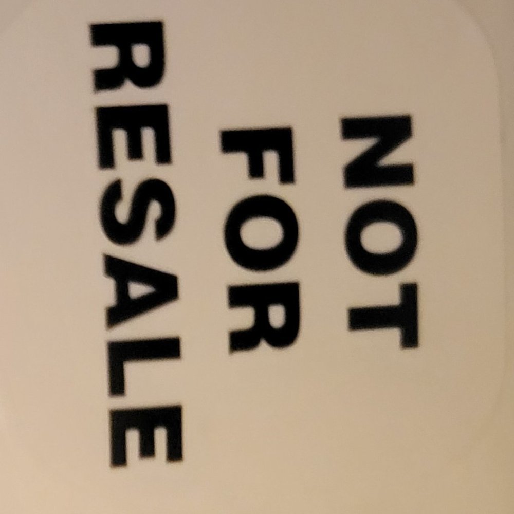 TWELVE (12) NOT FOR RESALE WHITE WITH BLACK WRITING STICKERS